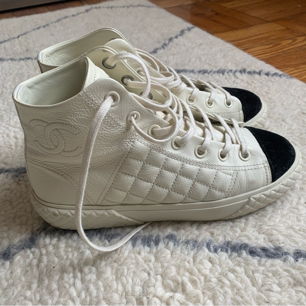Chanel Women's 21B Quilted High Top Sneakers - Cream and Black